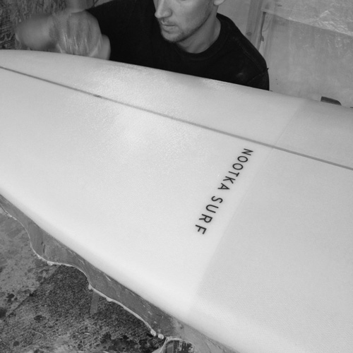 Nootka Surf M doing the fiberglass job